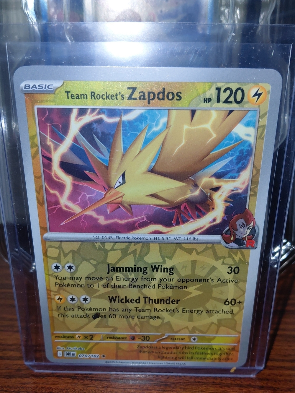 Team Rocket's Zapdos Pokémon Card - Yellow Lightning Artwork